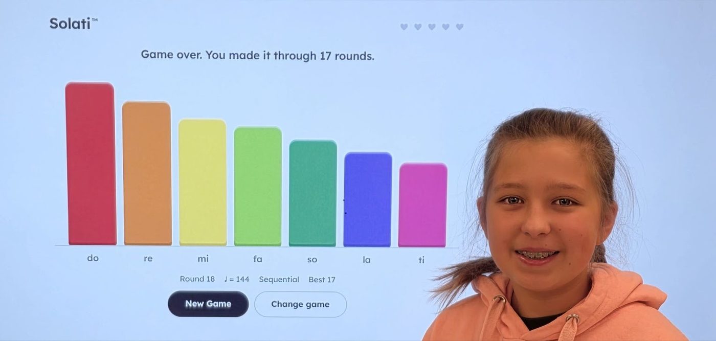 Student in front of the Solati ear-training game after making it through 17 rounds